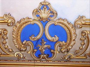 Detail of plasterwork on the Long Gallery ceiling showing a GG monogram 